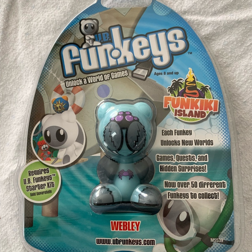UB Funkeys Webley Very Rare Blue M5539 Mattel Radica Funkiki Island. 

New